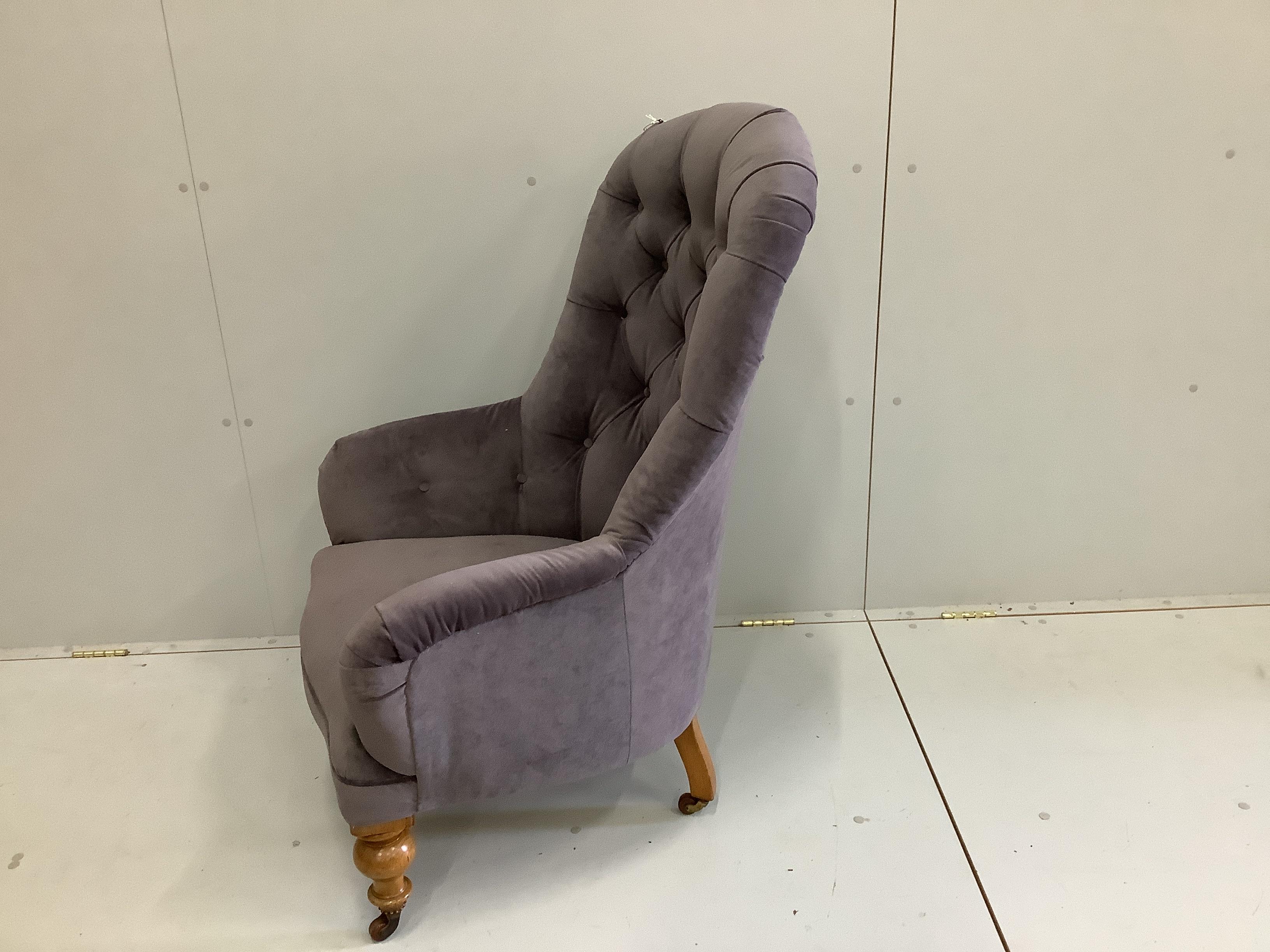 A Victorian upholstered spoonback armchair, width 68cm, depth 64cm, height 110cm